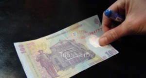 Poliţist reţinut pentru luare de mită