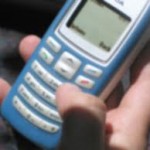 Prins cu mobilul la bac