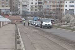 Cât costă asfaltarea podului de la Drăgaică