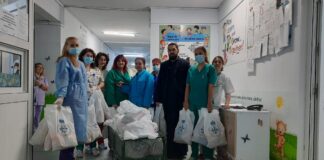 (Galerie FOTO) Preotul Spitalului, Moș Nicolae pentru zeci de copii internați