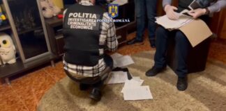 Percheziții. Peste 20 de buzoieni, cercetați pentru credite obținute cu acte false