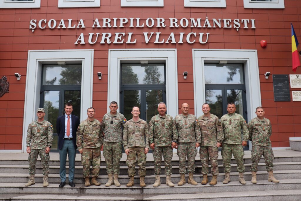 Christopher Gamble, Școala Militară de Maiștri Militari și Subofițeri a Forțelor Aeriene „Traian Vuia”.