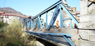 (FOTO) Pod nou la Nehoiu, pe DN 10. Contract semnat în prezența lui Marcel Ciolacu