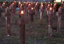 (FOTO) Mormintele din Cimitirul Eroilor, luminate de candele