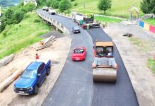 (VIDEO) Asfaltări pe DN 10, în zona Siriu. Restricții temporare de circulație