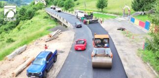 (VIDEO) Asfaltări pe DN 10, în zona Siriu. Restricții temporare de circulație