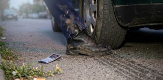 Porcu’ l-a târât pe polițistul Gribincea și a fugit. Instructorul auto, arestat. Procurorii vin cu detalii