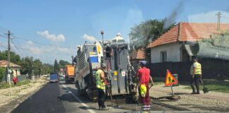 (FOTO) Asfaltări în Cislău, pe DN 10. Primar: Vor urma și străzile aferente